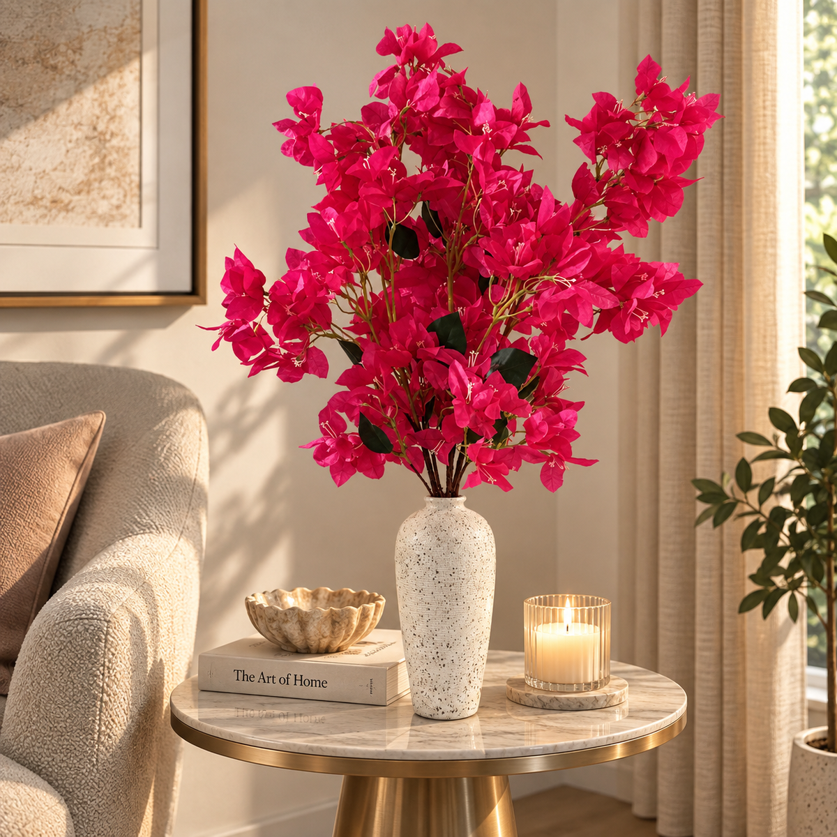 Hot pink bougainvillea stems in a tall speckled white vase with dark green leaves