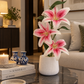 Pink and white lily bouquet in light textured ceramic vase